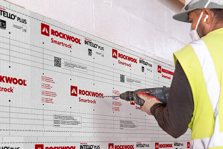 Installer fastening Smartrock boards to masonry