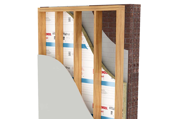Cutaway of an interior masonry wall assembly with Smartrock insulation